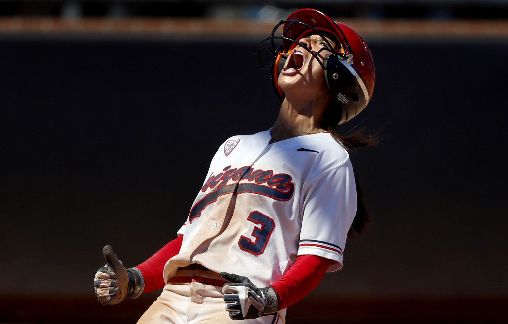 Arizona's Chelsea Suitos (3) gives out a big yell after scoring the Wildcats' fifth run against Minnesota in the sixth inning of their NCAA regional game at Hillenbrand Stadium, Saturday, May 16, 2015, Tucson, Ariz. Kelly Presnell / Arizona Daily Star