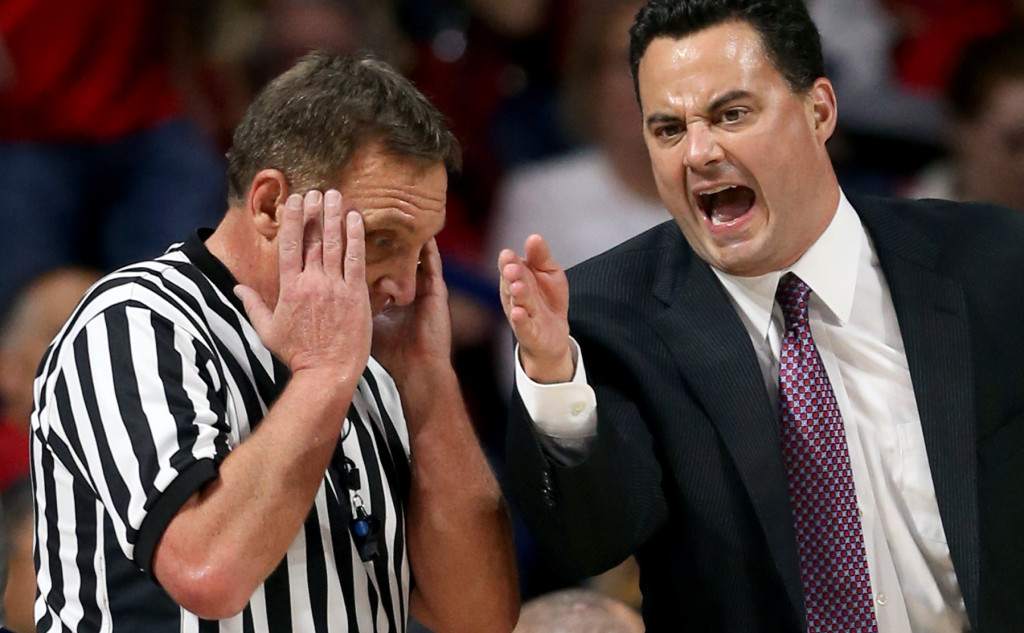 Arizona head coach Sean Miller pleads his case to referee Dave Hall after his Wildcats picked up a charging call against Boise State in the first half of their game at McKale Center, Thursday Nov. 19, 2015, Tucson, Ariz.  Kelly Presnell / Arizona Daily Star