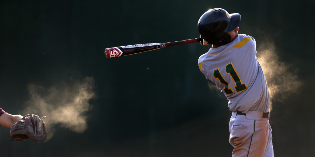 Canyon del Oro's Nate Soriano (11) takes a big swing but comes up empty in the fifth inning against Salpointe in the first game of the DII state quarterfinals at Amphitheater High School, Friday, May 8, 2015, Tucson, Ariz. Kelly Presnell / Arizona Daily Star