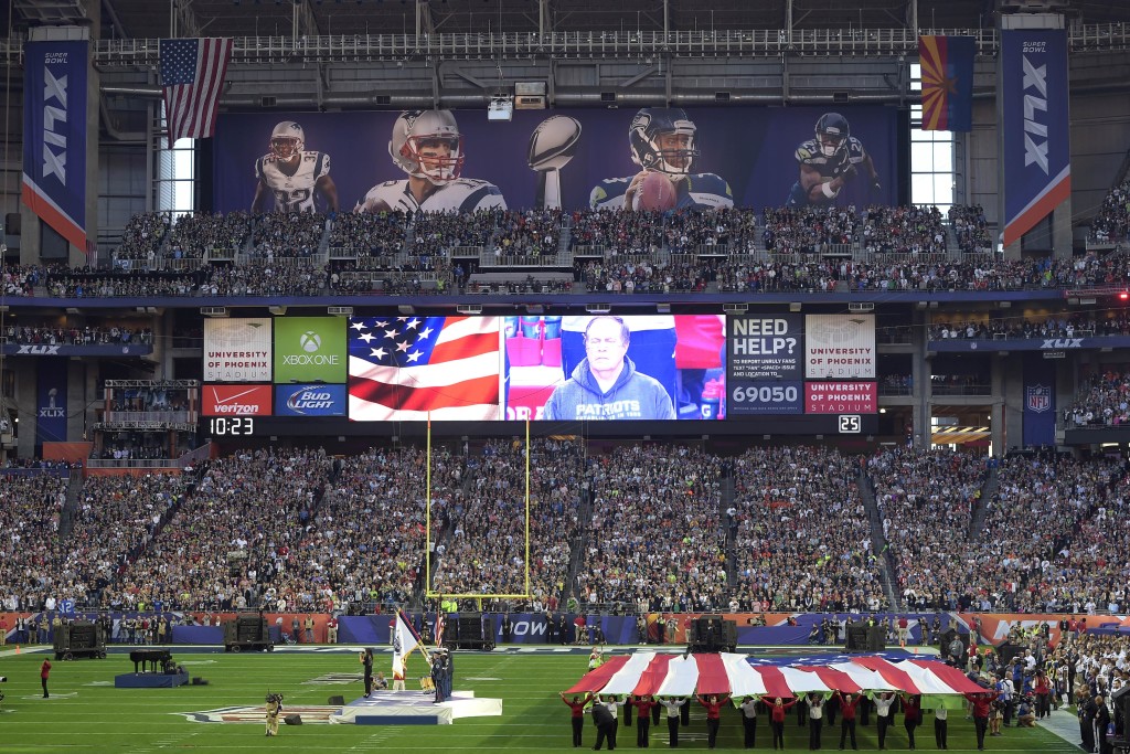 Feb 1, 2015; Glendale, AZ, USA; A general view of the national anthem before the game between the Seattle Seahawks and the New England Patriots in Super Bowl XLIX at University of Phoenix Stadium. The Patriots won 28-24. Mandatory Credit: Joe Camporeale-USA TODAY Sports